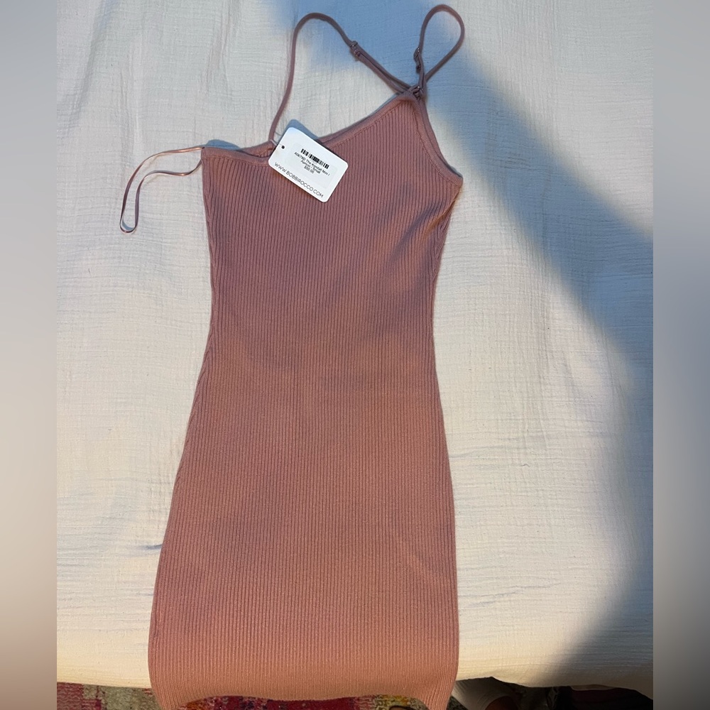 The Kendall Mini dress in Apricot. Bobbi Roccco size small.